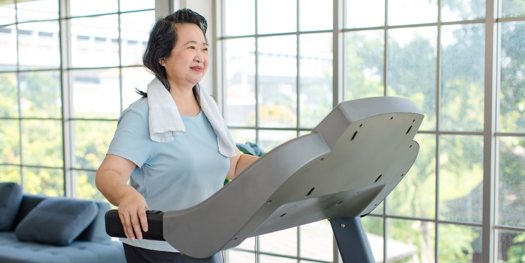 Older Asian women on treadmill 