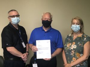 Tom Buerkle, Materials Manager at Emerson Industrial Automation/ASCO Numatics; Steve Barnett, McKenzie President and CEO; and Deanna Lester, Occupational Health Nurse and RN-Contingent Med/Surg and ER