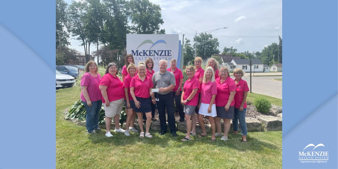 Auxiliary members present McKenzie President and CEO Steve Barnett with a $30,000 check as part of their $100,000 pledge toward the new hospital building project.